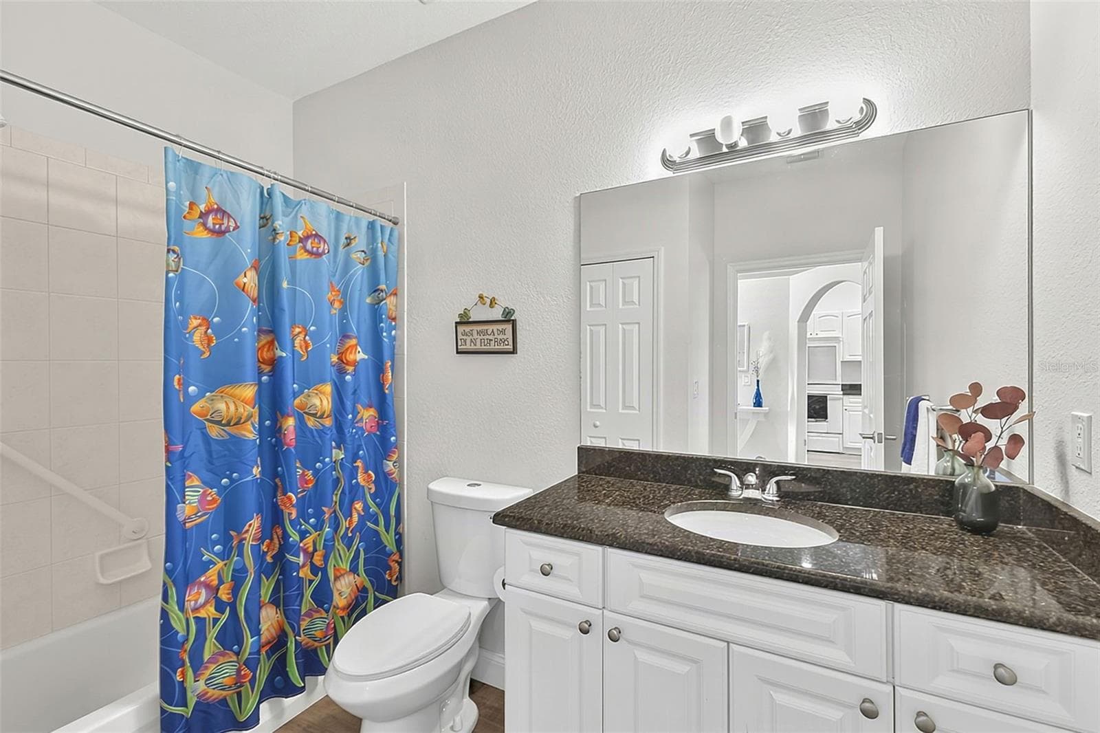 Full bathroom off the hallway granite countertops - 101 NATURES WAY #1307, ROTONDA WEST