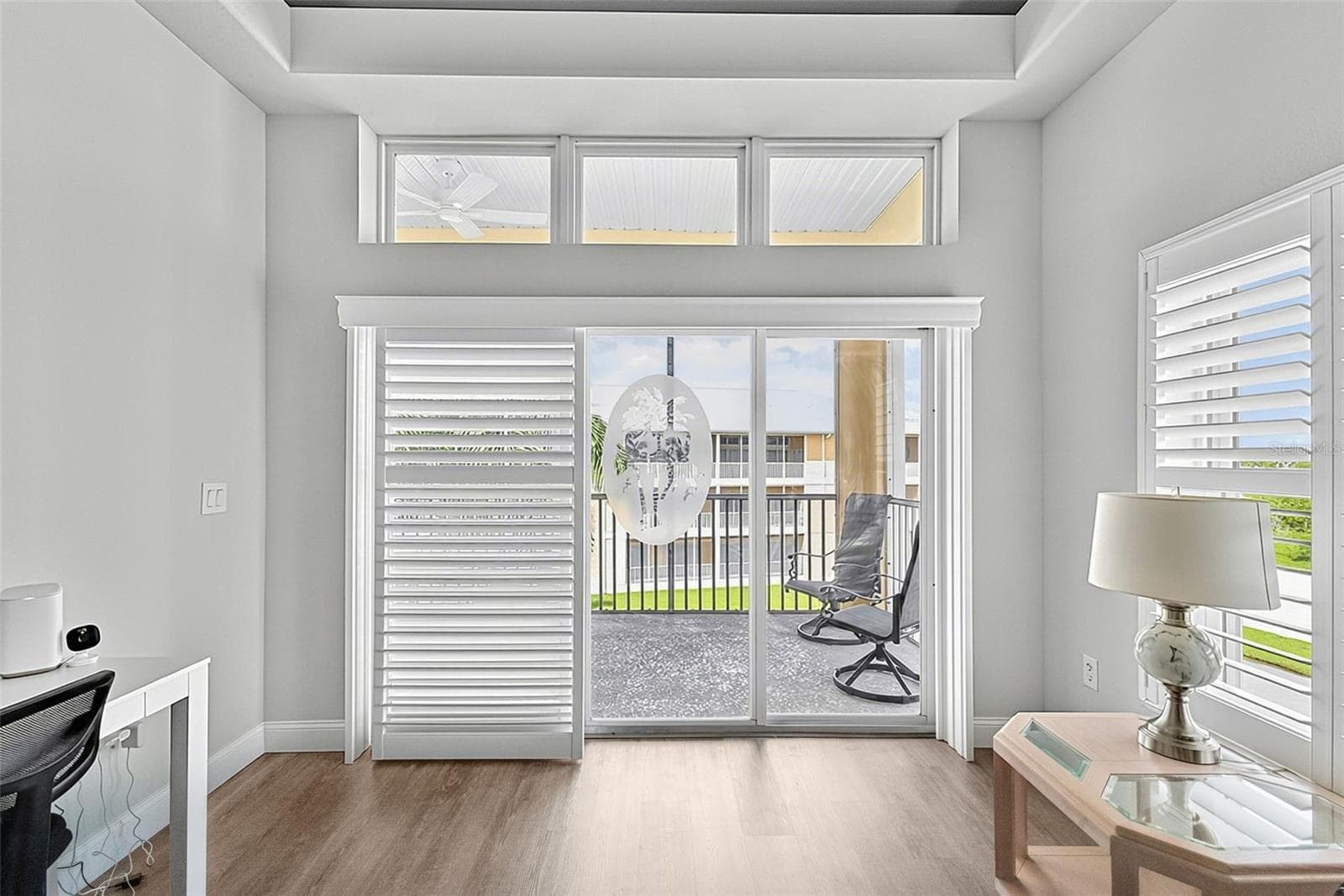 Blinds retract for light and view - 101 NATURES WAY #1307, ROTONDA WEST