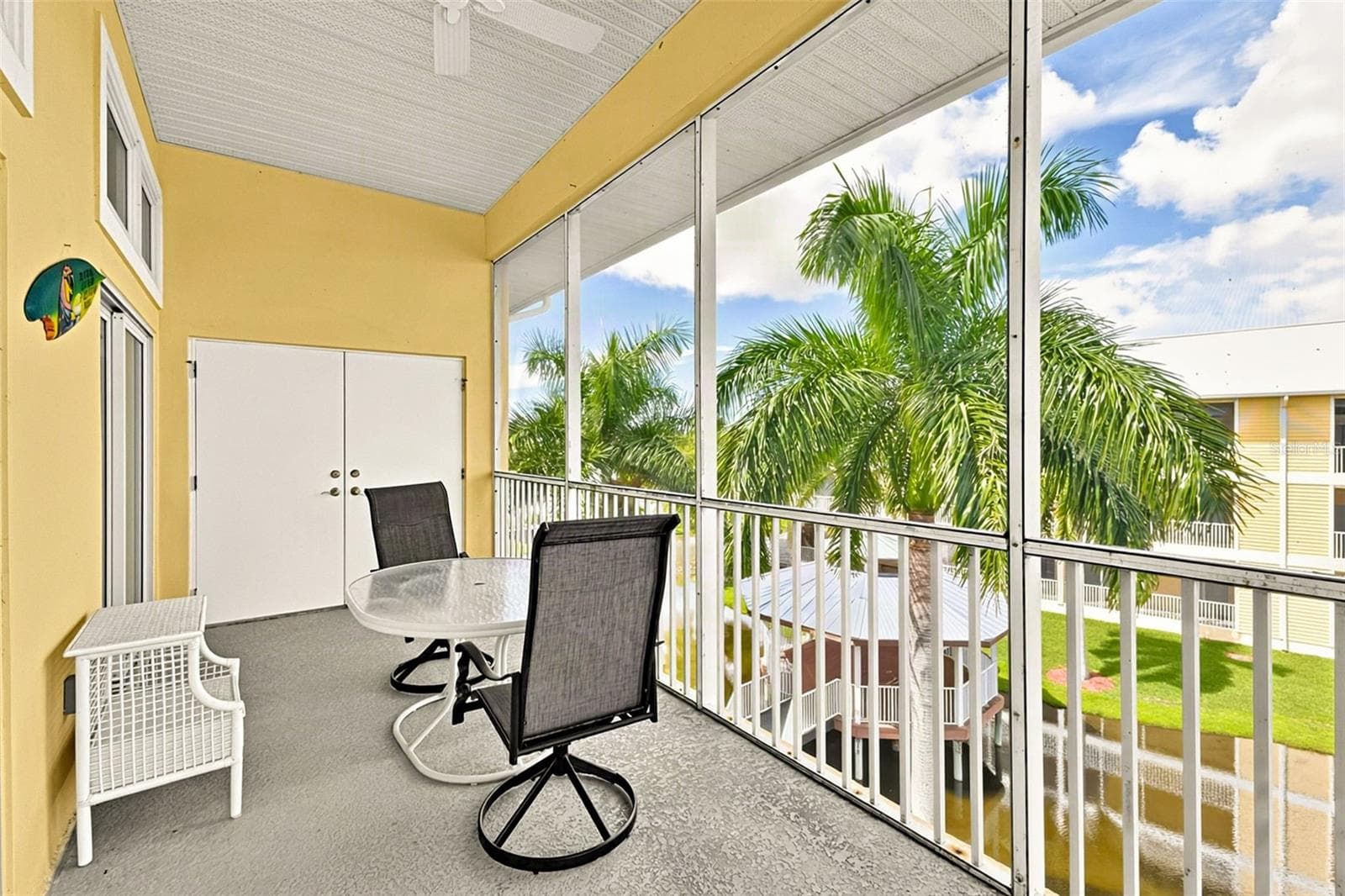 Patio with storage unit - 101 NATURES WAY #1307, ROTONDA WEST