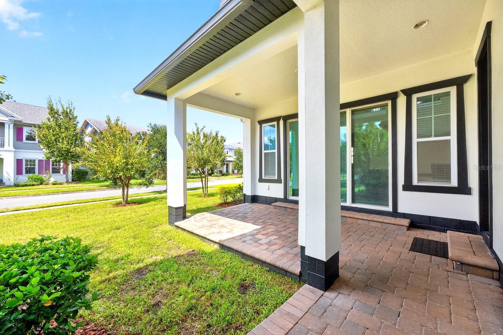 Covered paver lanai. - 9024 NEHER ST, ORLANDO
