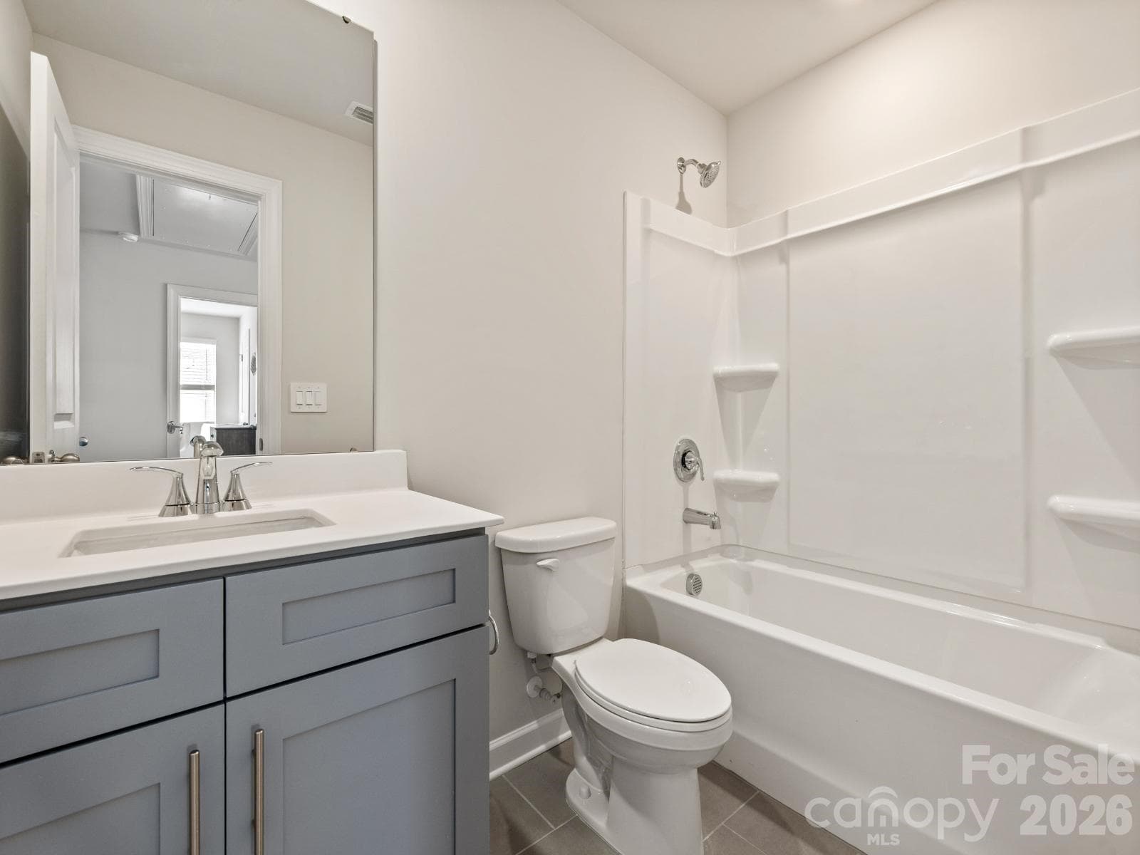 Photo is not of the actual home, but is an inspirational photo of builder’s model home and may depict options, furnishings, and/or decorator features that are not included - 12640 Russellwood Lane, Charlotte