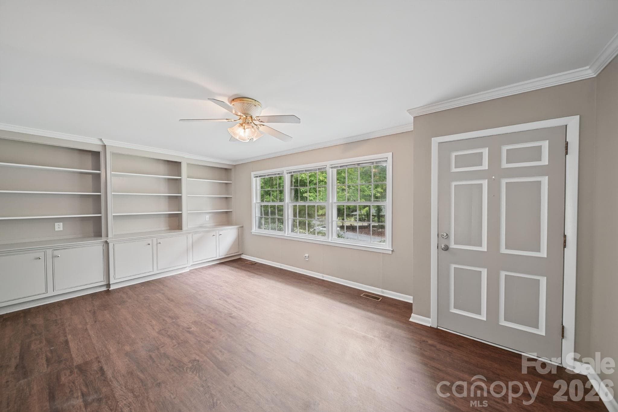 living room with built in shelving - 204 Breslin Street, Wadesboro
