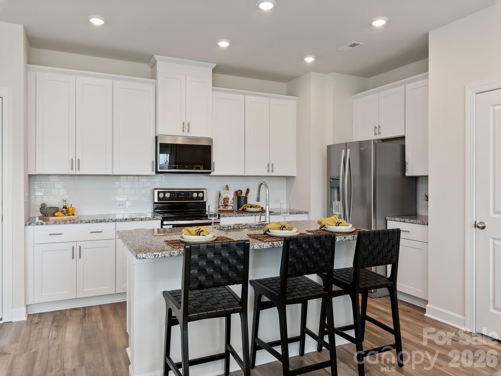 Photo is not of the actual home, but is an inspirational photo of builder’s model home and may depict options, furnishings, and/or decorator features that are not included - 12636 Russellwood Lane, Charlotte