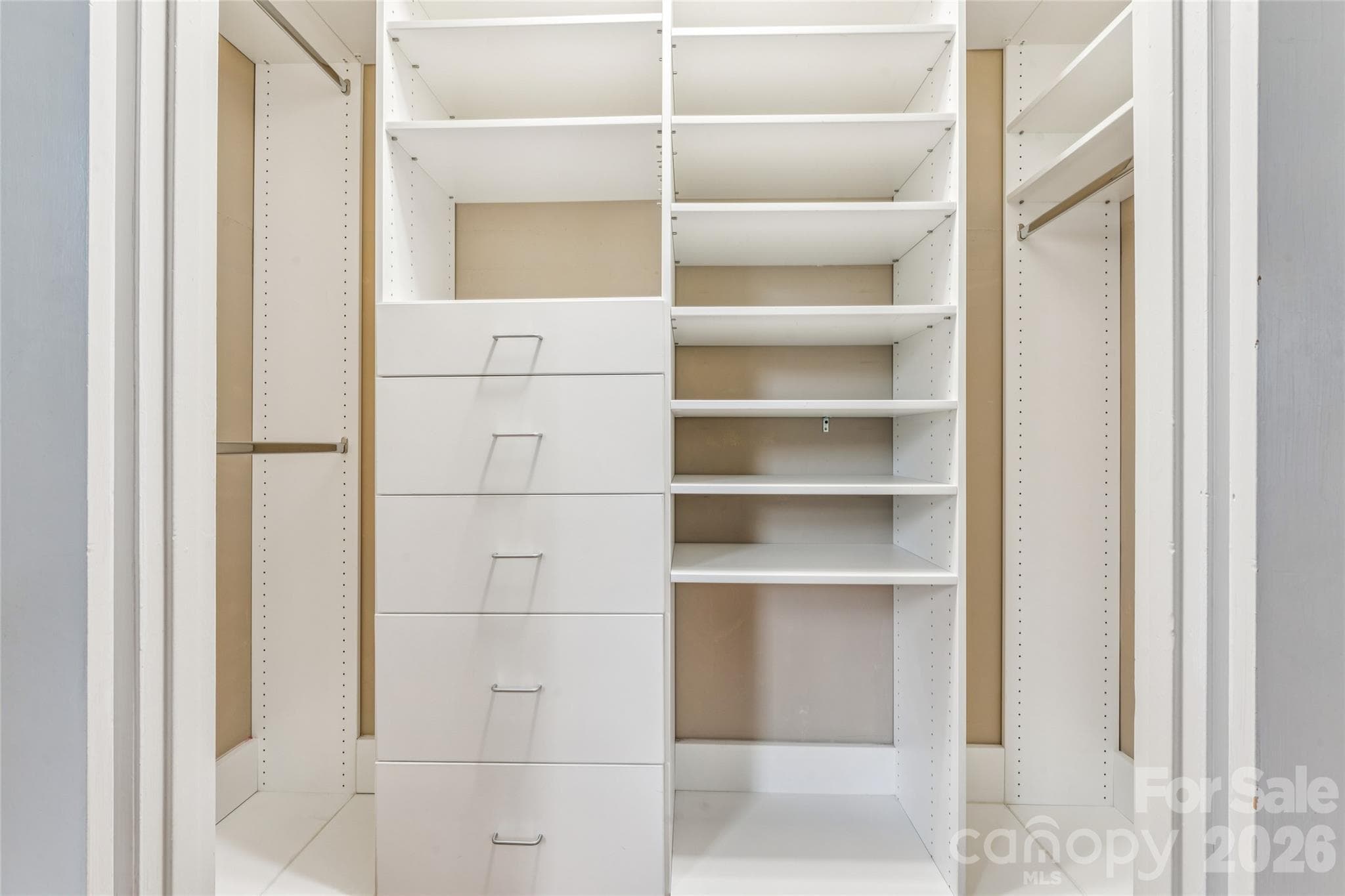 Primary custom closet. - 6501 Wheeler Drive, Charlotte