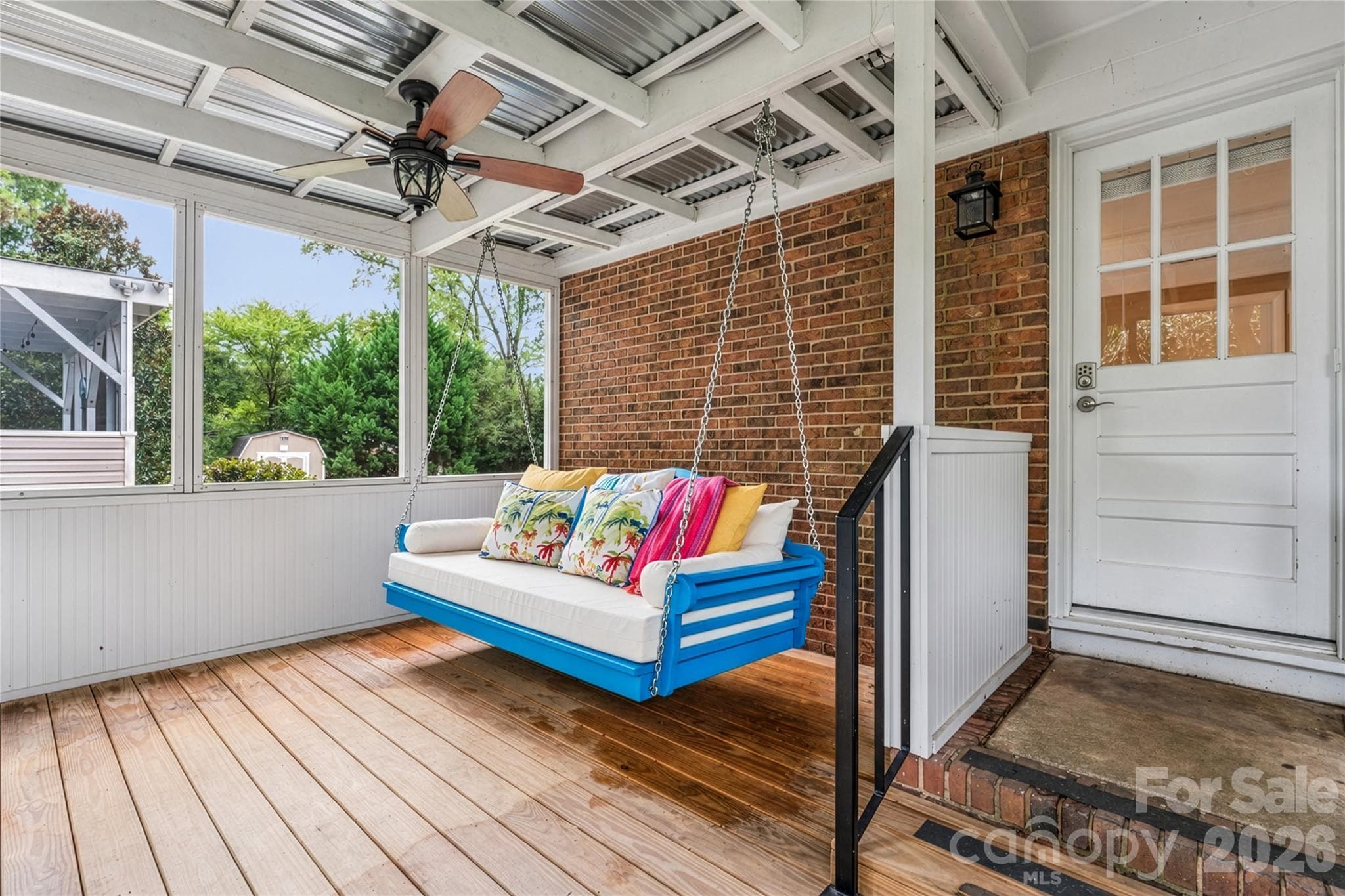 Screened porch off carport and family room. - 6501 Wheeler Drive, Charlotte