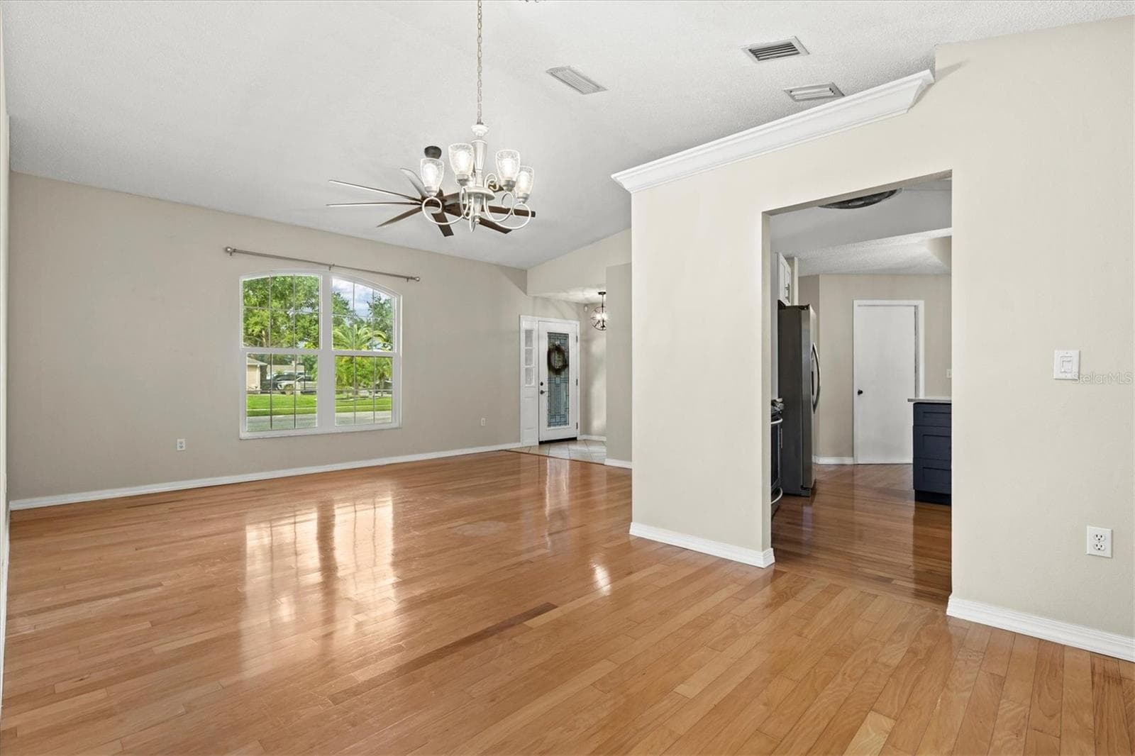 Dining room and kitchen entry - 7129 QUEEN PALM CIR, SARASOTA