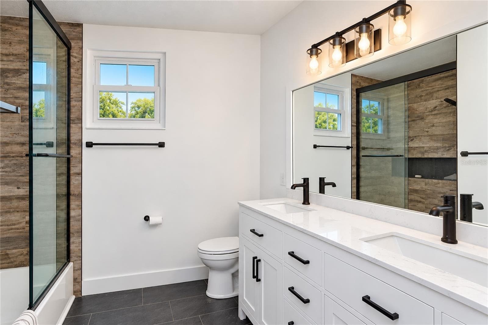 Fully remodeled bathroom features a double vanity - 901 WOODVIEW DR, BRANDON