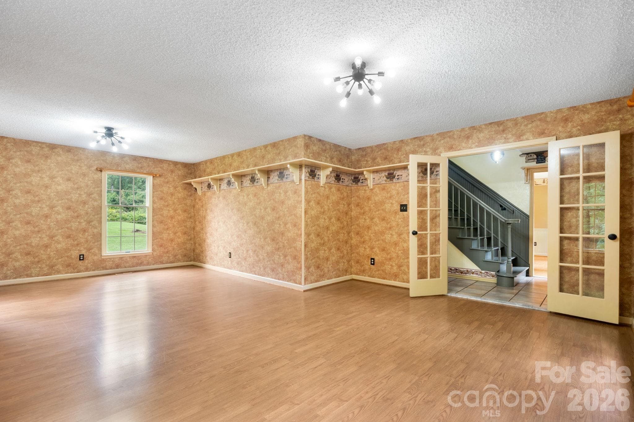 living room view to foyer - 3110 Ninth Tee Drive, Newton