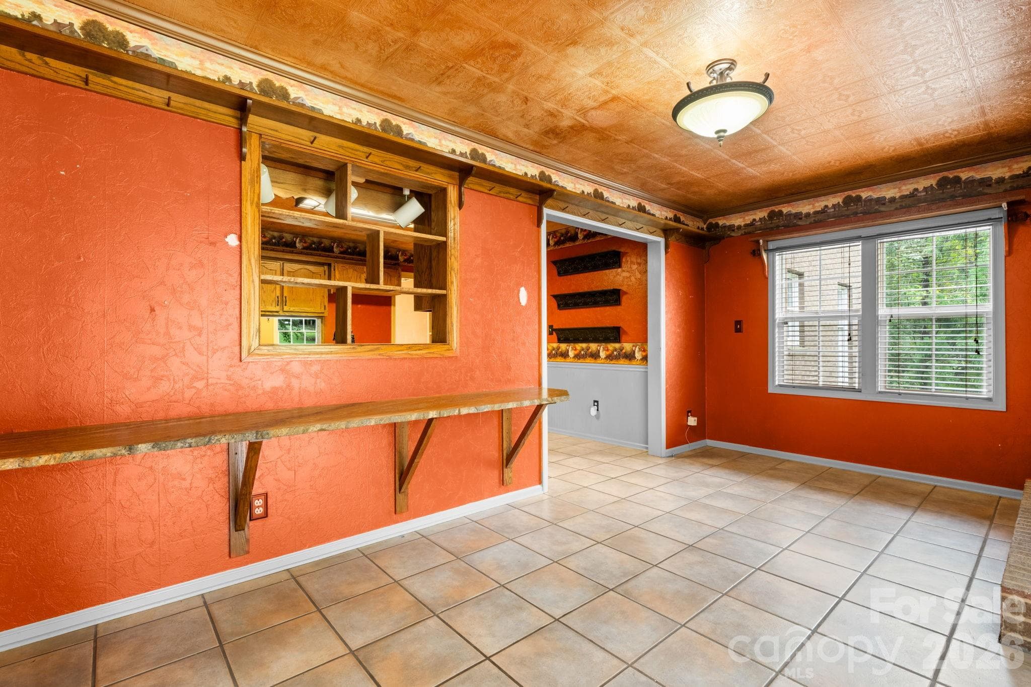 den area with opening to kitchen - 3110 Ninth Tee Drive, Newton