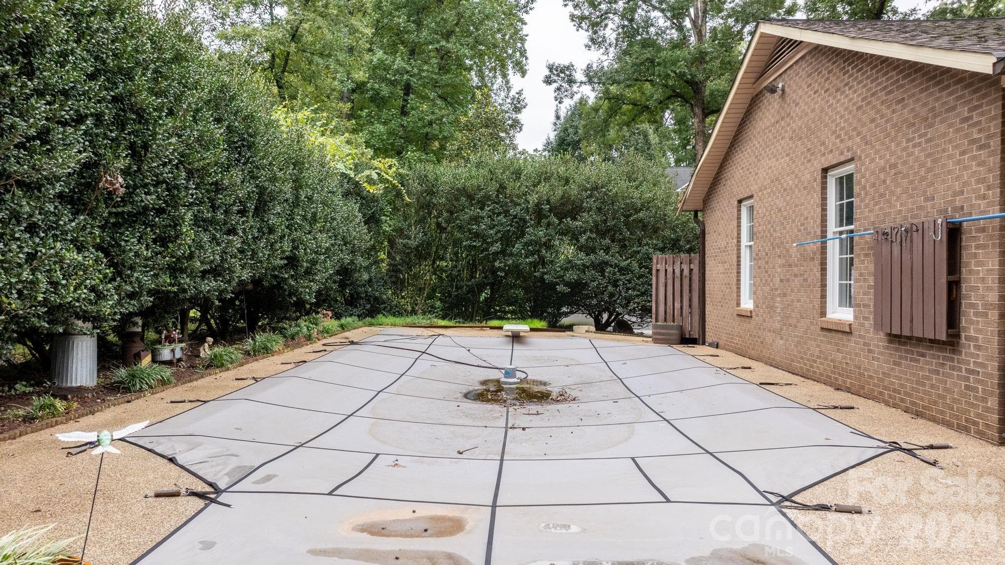 pool currently covered - 3110 Ninth Tee Drive, Newton