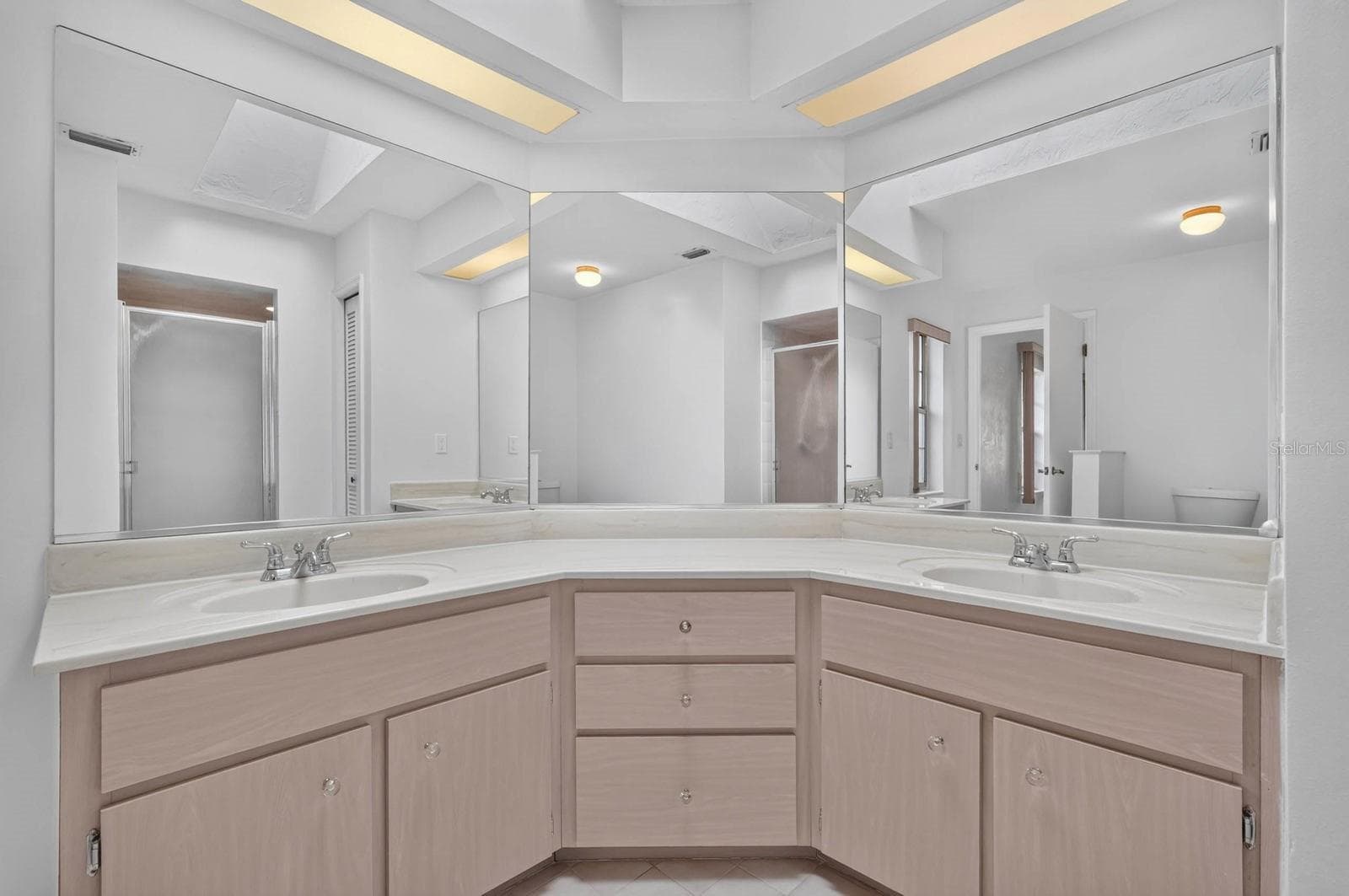 Primary bathroom has double vanity sink marble countertop - 156 BRESSLER LN, PALM COAST