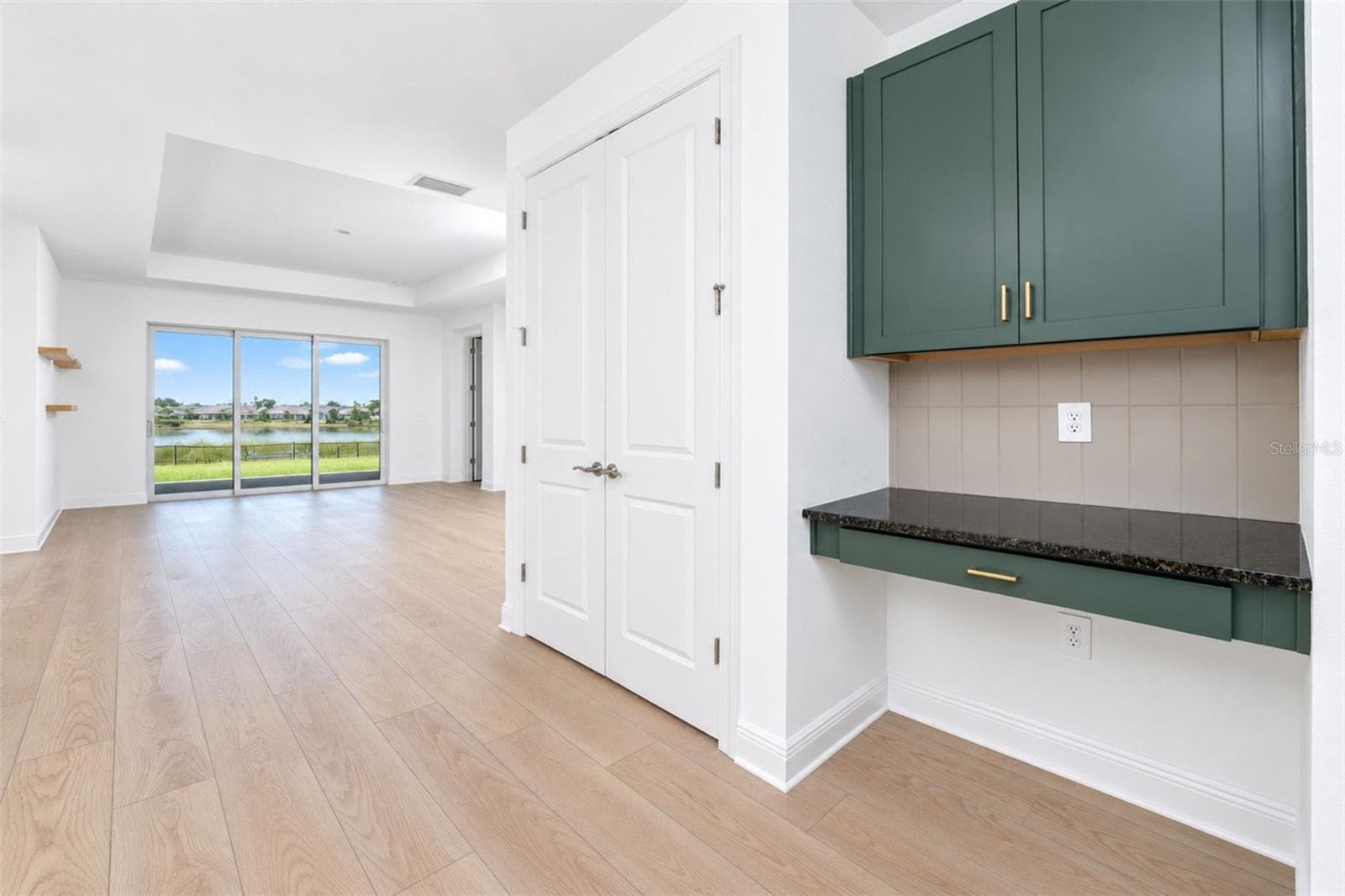 Convenient built-in desk/workstation or coffee station with cabinetry and coordinating gold hardware. - 237 VISTERA BLVD, NOKOMIS