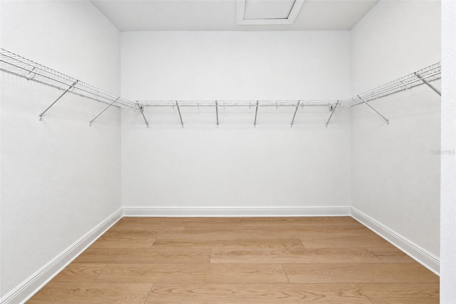 Extra-large primary walk-in closet offering abundant storage and shelving - 237 VISTERA BLVD, NOKOMIS
