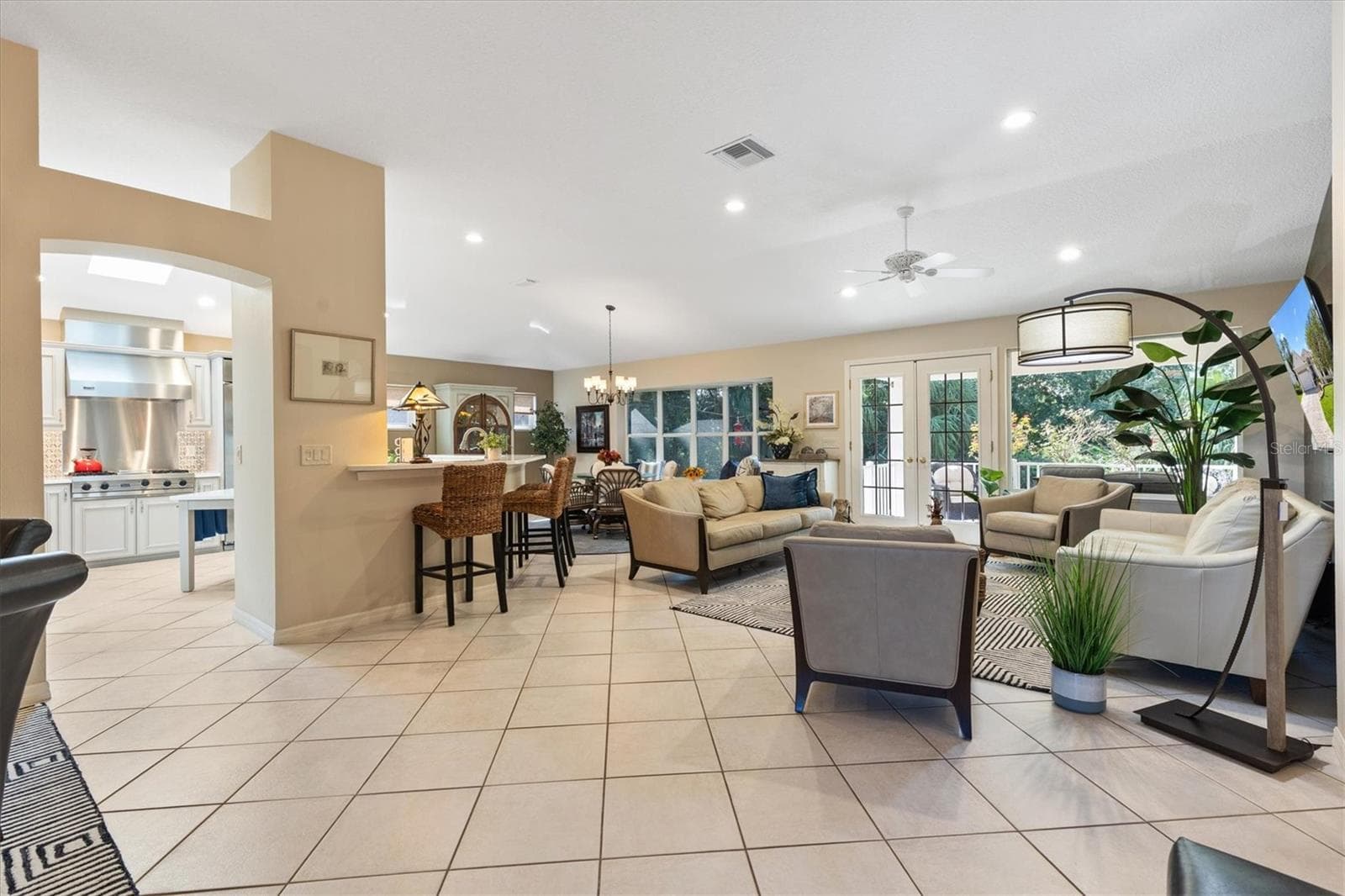 Living Room with Kitchen - 1302 LA ESTRELLITA WAY, THE VILLAGES