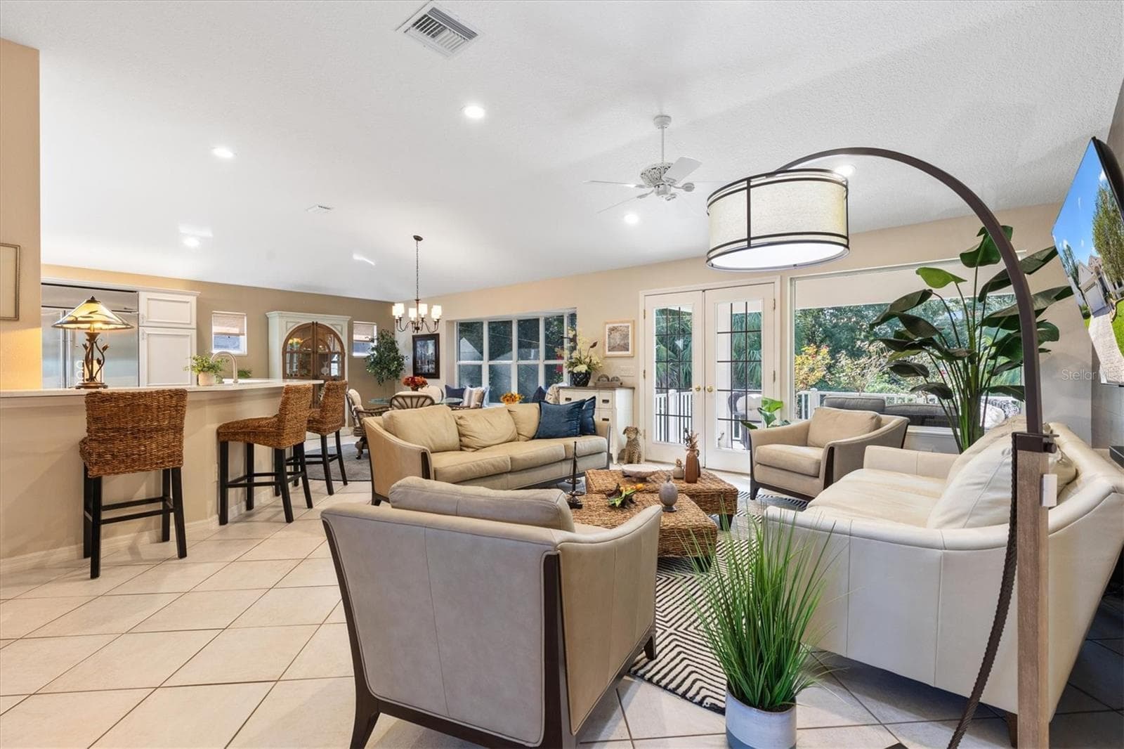 Living Room with kitchen - 1302 LA ESTRELLITA WAY, THE VILLAGES