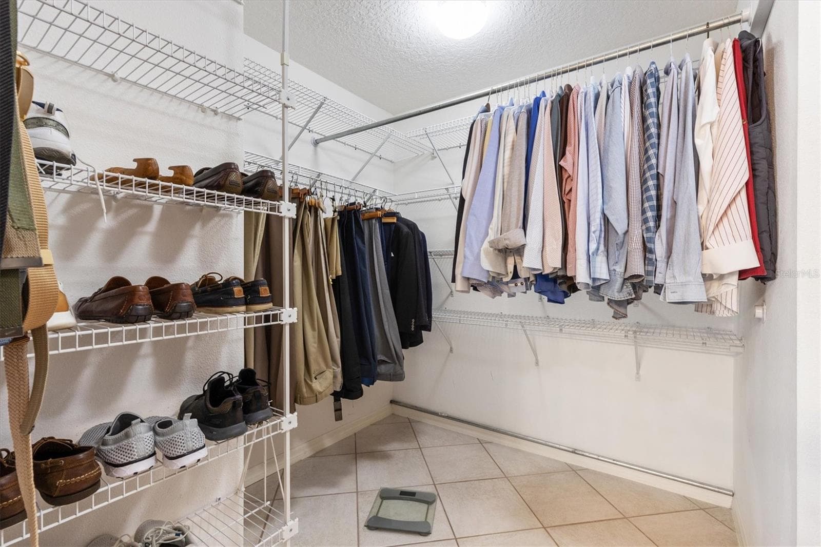 Primary Closet - 1302 LA ESTRELLITA WAY, THE VILLAGES