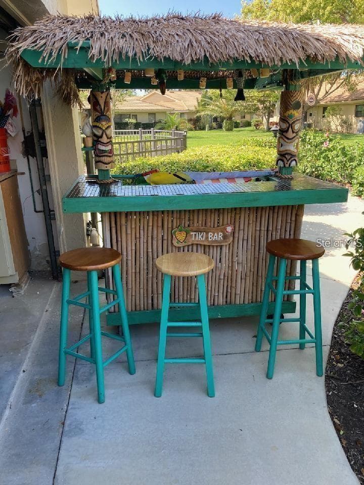 POOLSIDE TIKI FOR PARTIES - 7143 WOOD CREEK DR #203, SARASOTA