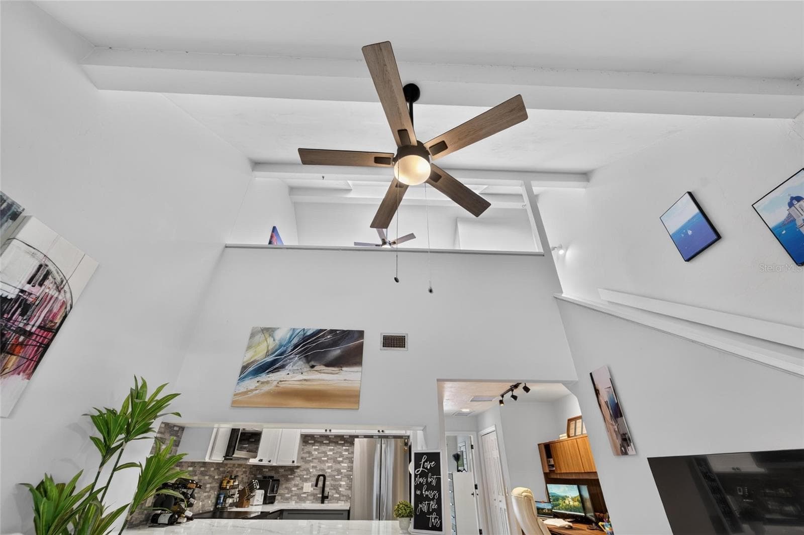 WOW! Soaring ceilings, modern lighting, and an open, airy design. This is no ordinary condo! - 5205 OAK CHARTER CT, TEMPLE TERRACE
