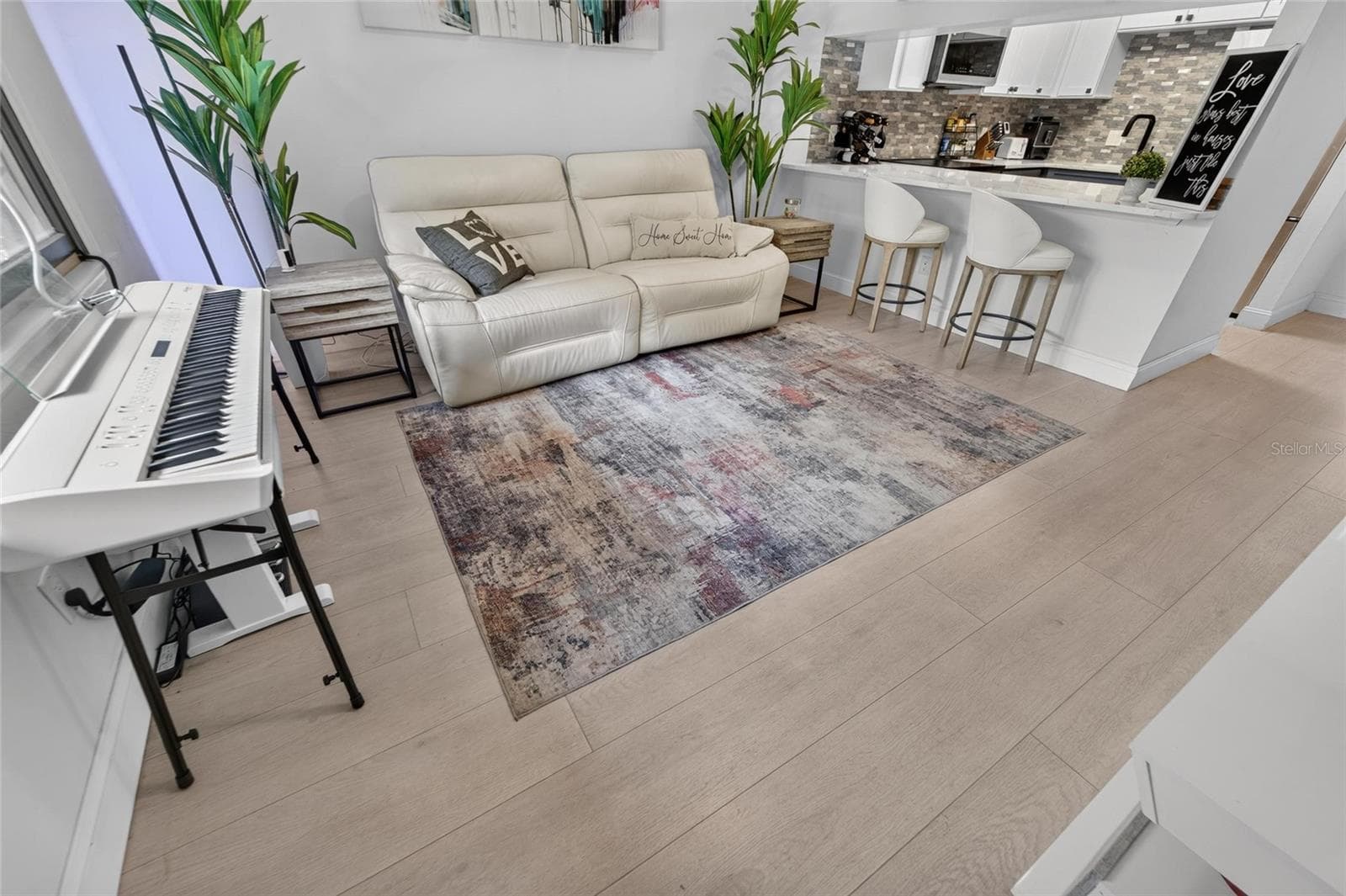 Living Room view from stairs. - 5205 OAK CHARTER CT, TEMPLE TERRACE