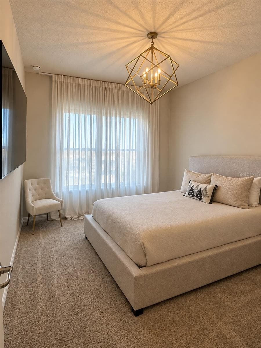 Guest Suite – Spacious and inviting guest suite featuring a private in-suite bathroom - 6735 REVERIE PARK AVE, ORLANDO