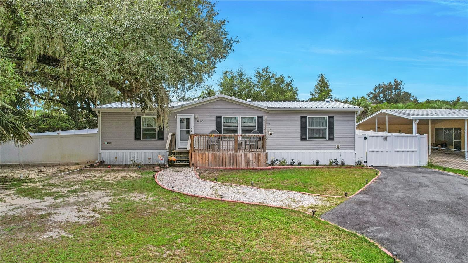 Manufactured Home at 15068 SE 105TH AVE, SUMMERFIELD, photo 2 of 36