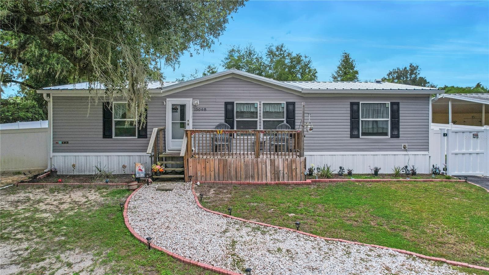 Manufactured Home at 15068 SE 105TH AVE, SUMMERFIELD, photo 4 of 36