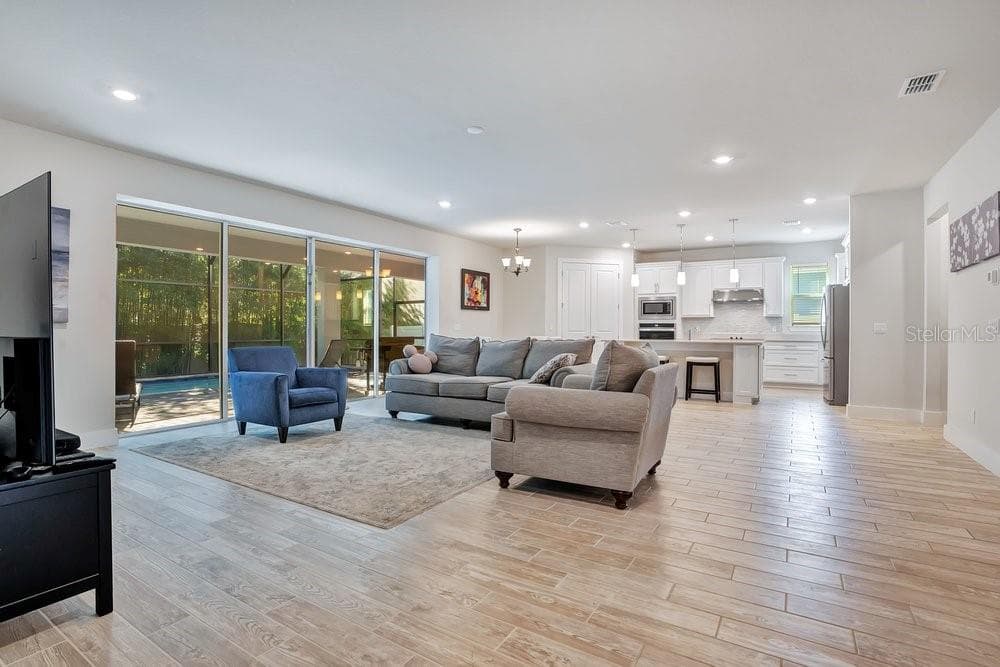 family room - 704 FOX EDGE CT, OVIEDO