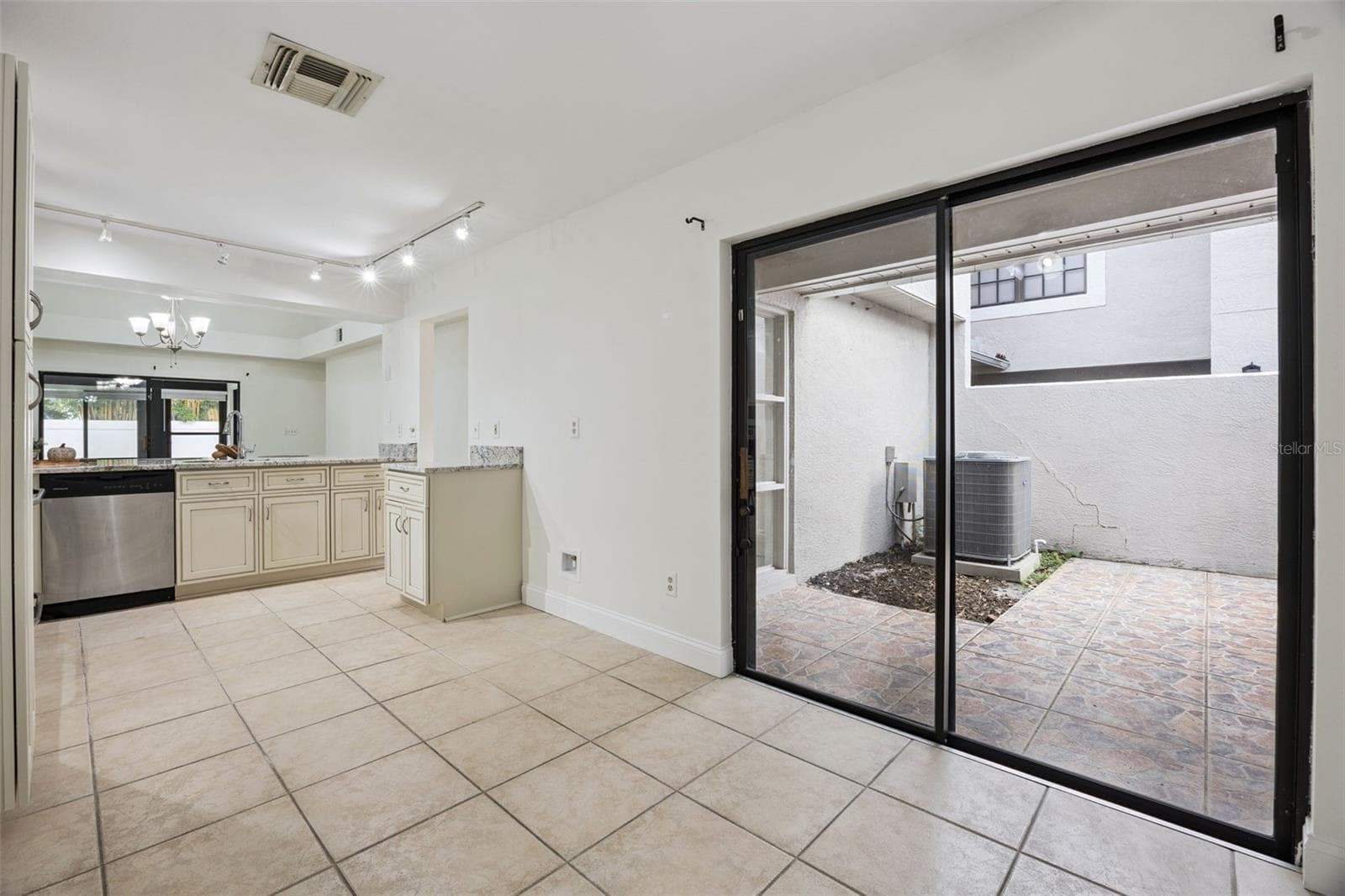 Kitchen with access to entryway - 8370 SANDPOINT BLVD, ORLANDO