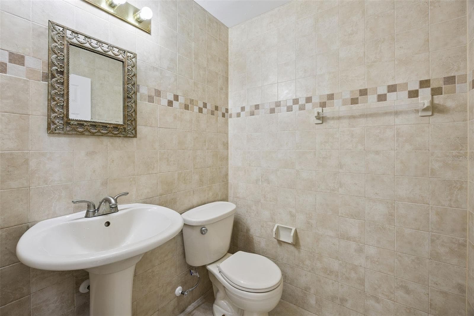 Half bath-1st floor - 8370 SANDPOINT BLVD, ORLANDO