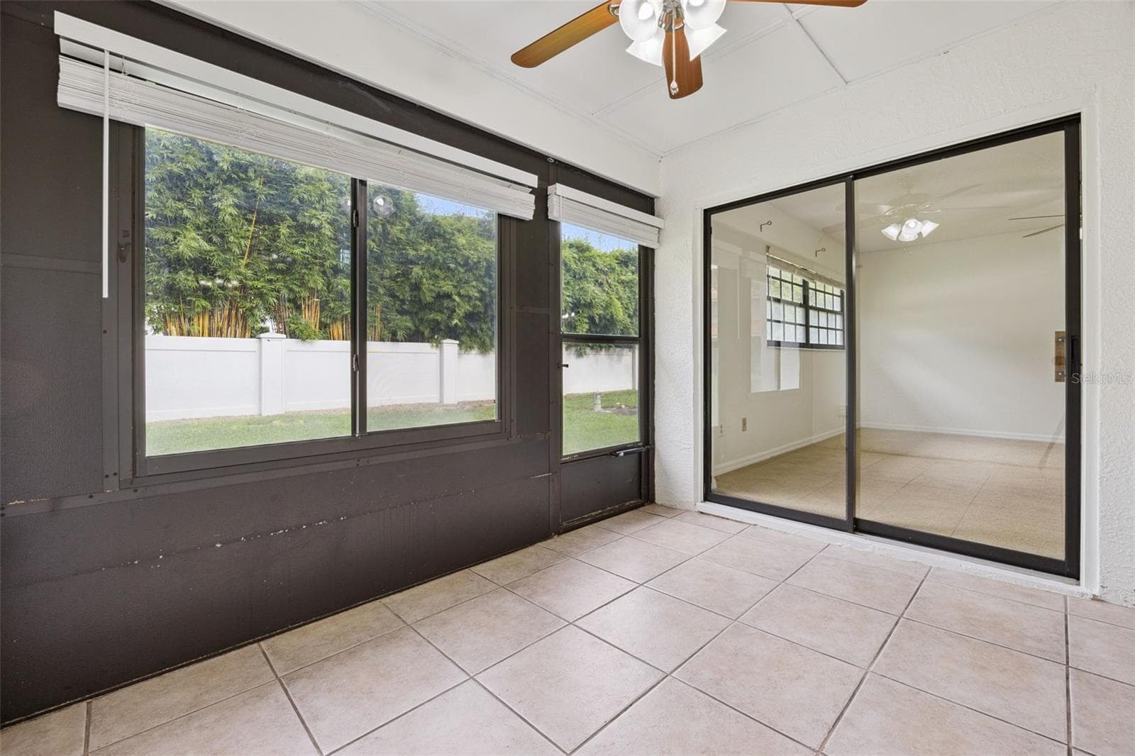 Lanai with access to primary bedroom and living room - 8370 SANDPOINT BLVD, ORLANDO