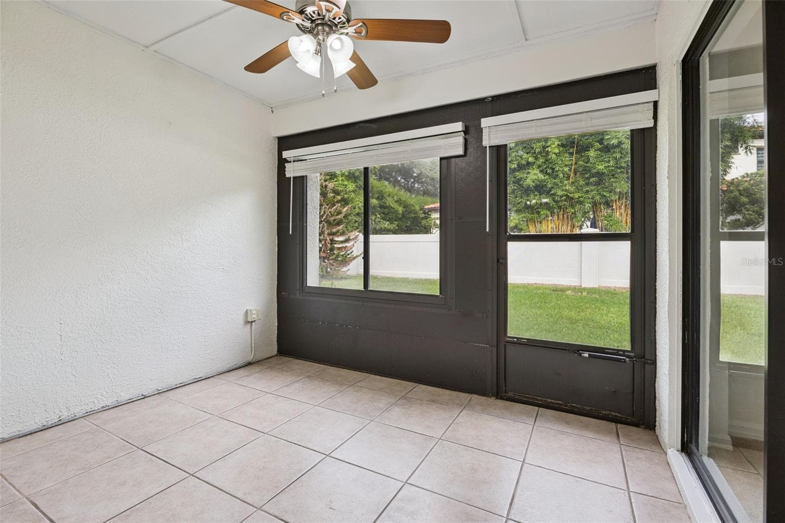 Lanai with access to primary bedroom and living room - 8370 SANDPOINT BLVD, ORLANDO