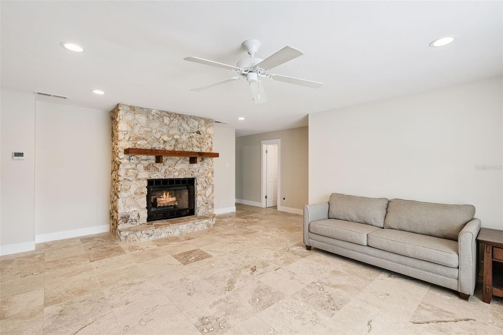 Living Room Wood Burning Fireplace - 14335 FRESNO DR, ORLANDO