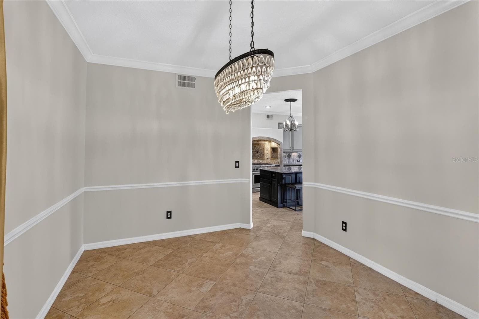 Not staged: Formal dining room shown without furniture. - 2109 WEMBLEY PL, OVIEDO