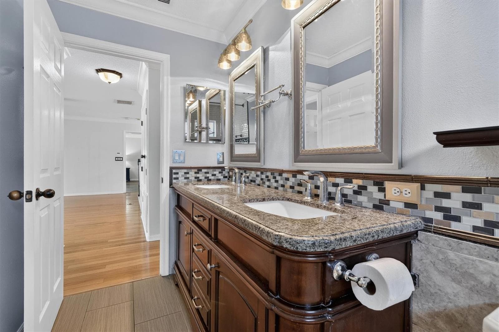 Alternate view of the bathroom vanity and mirror. - 2109 WEMBLEY PL, OVIEDO