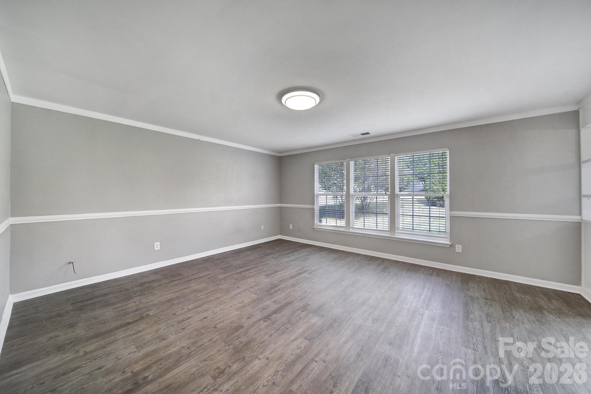 Nice natural light in family room - 5228 Moonlight Trail SW, Concord