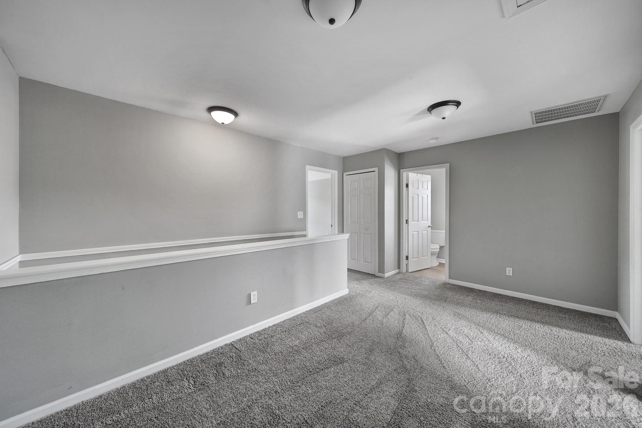 Bonus Loft at the top of stairs, bedrooms and hall bath surround this space - 5228 Moonlight Trail SW, Concord