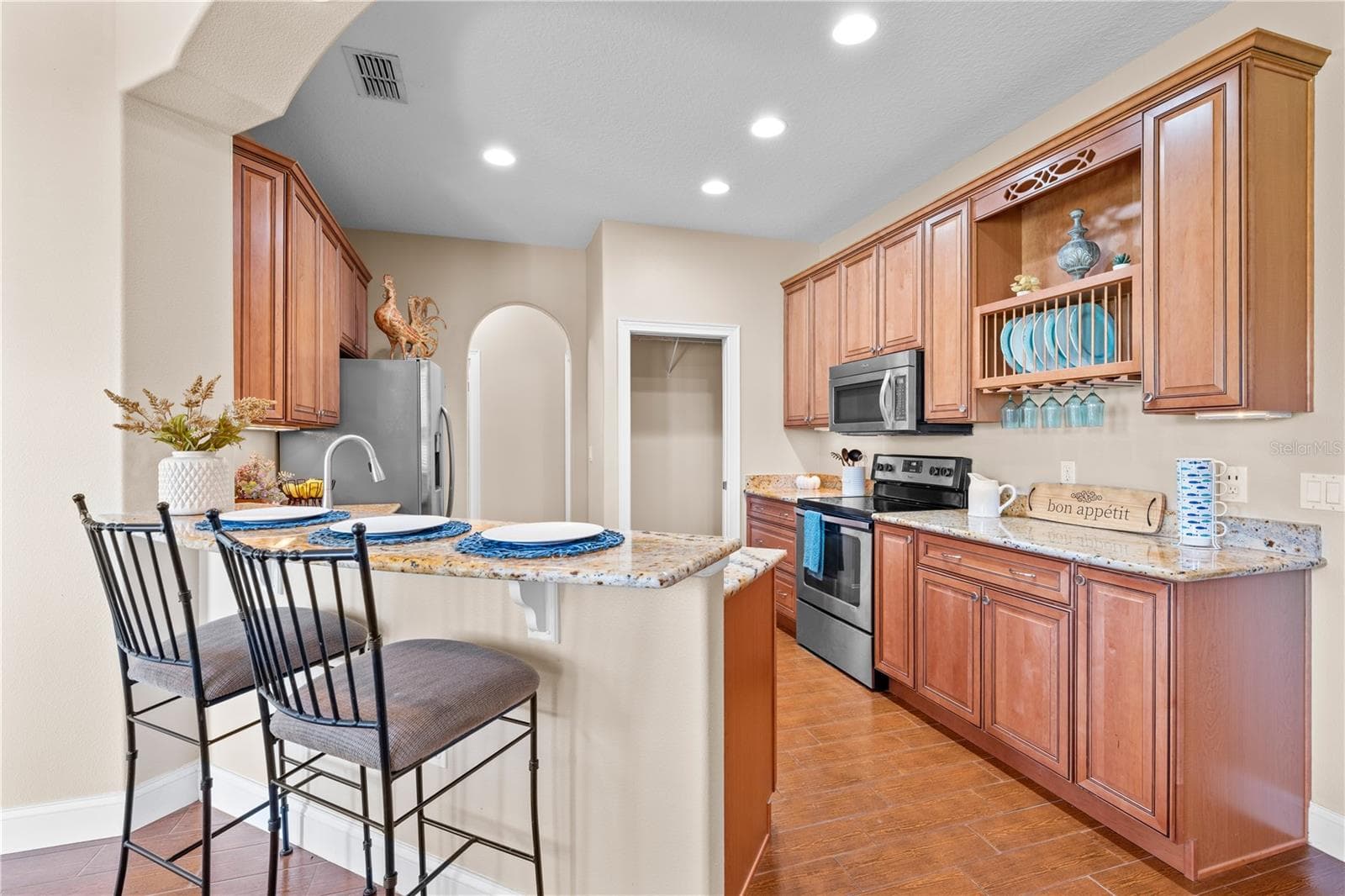 Custom Cabinets and Granite Countertops in the Kitchen. - 4349 PACKARD AVE, ST CLOUD