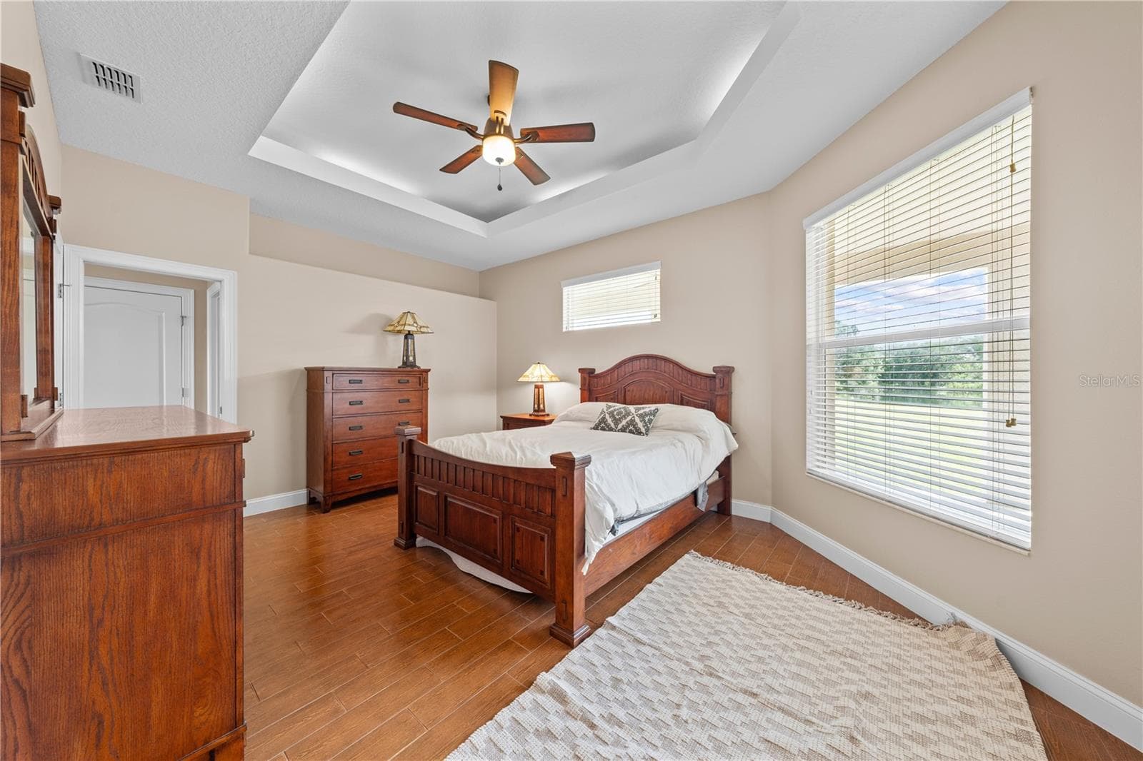Primary Bedroom with Tray Ceilings - 4349 PACKARD AVE, ST CLOUD