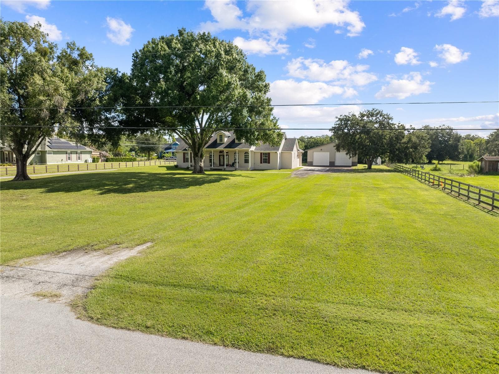 Entrance to the property off of Packard Avenue. - 4349 PACKARD AVE, ST CLOUD