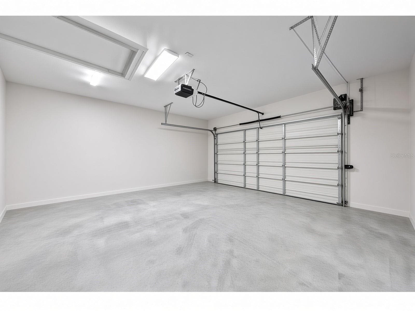 2 Car Attached Side Entry Garage with Garage Door Opener - 4349 PACKARD AVE, ST CLOUD