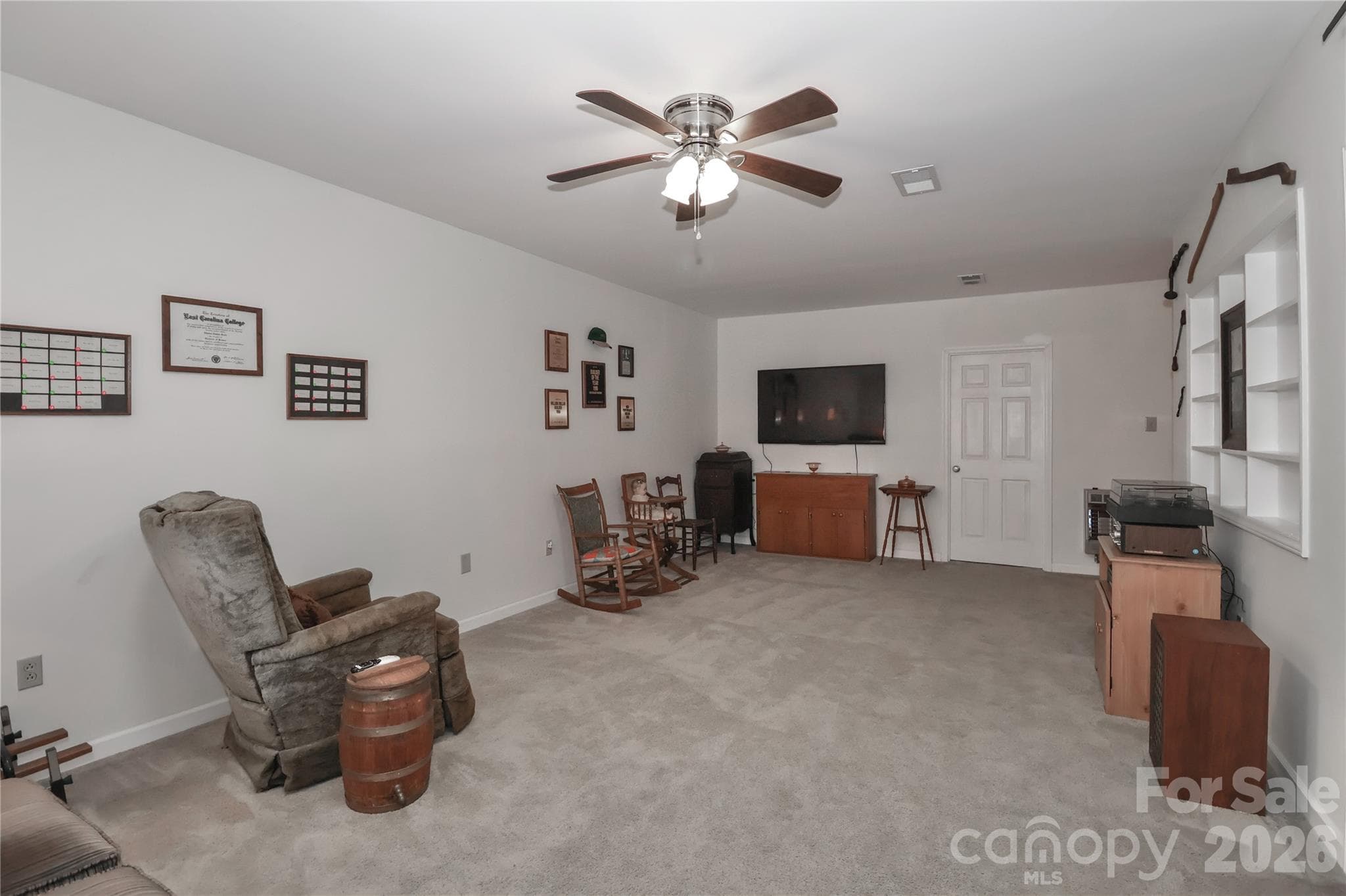 Lower level den with furniture - 1359 Radio Road, Statesville