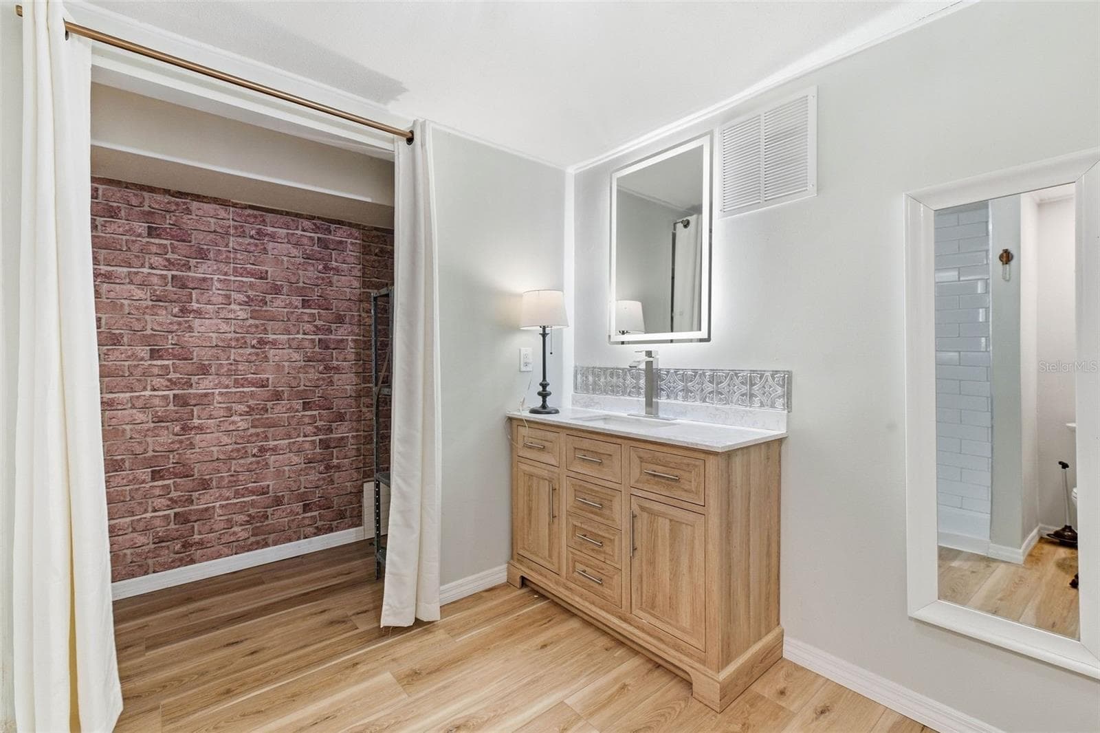 mother in law suite bathroom - 1304 TREETOP DR, PALM HARBOR