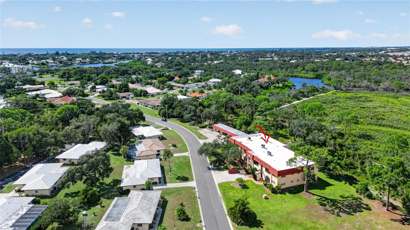 Aerial photo of the area with Oscar Sherer State Park and Gulf. - 203 RUBENS DR #F, NOKOMIS