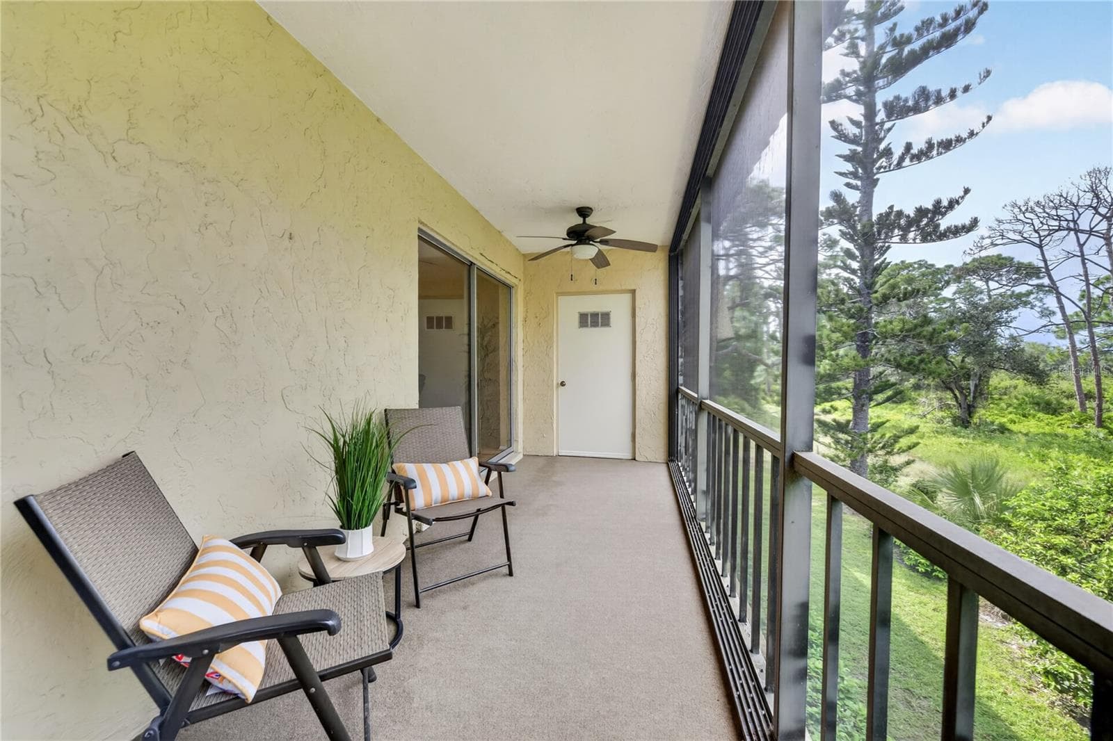Large screened backdoor lanai. - 203 RUBENS DR #F, NOKOMIS
