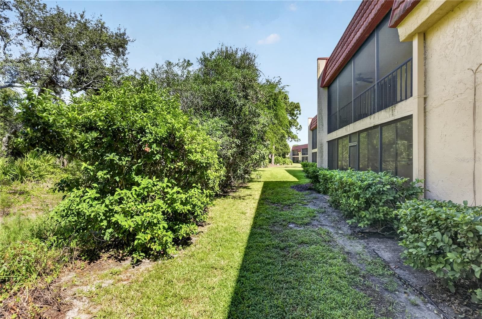 Rear of the building - Oscar Scherer State Park. - 203 RUBENS DR #F, NOKOMIS