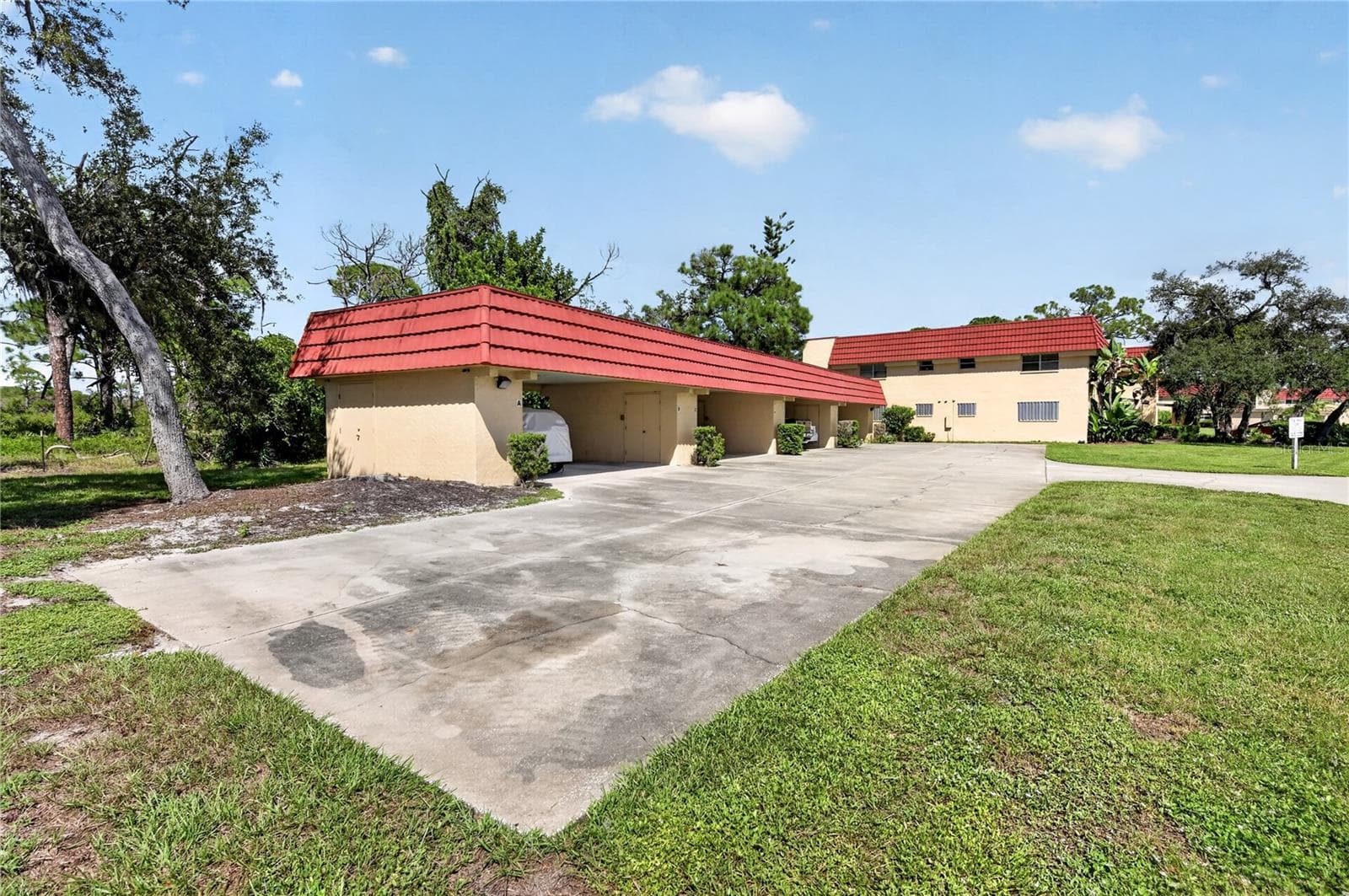 Building and carport. - 203 RUBENS DR #F, NOKOMIS