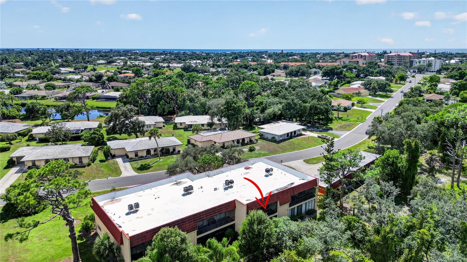 Aerial photo of the area and Gulf. - 203 RUBENS DR #F, NOKOMIS