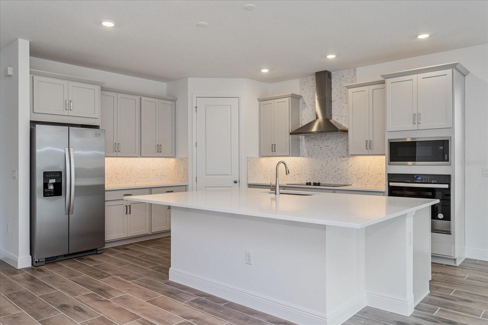 Note: The sample photos included are of the model home and are meant to showcase the craftsmanship and design quality. - 13356 PEACEFUL MELODY DR, WINTER GARDEN