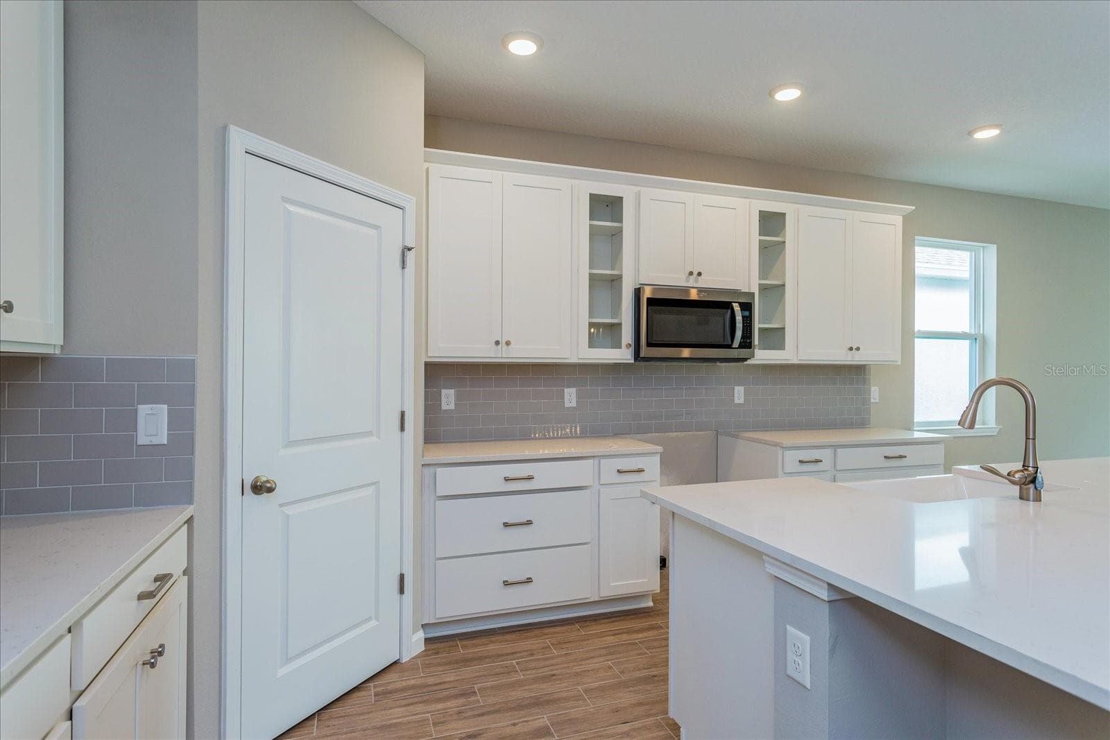 Note: The sample photos included are of the model home and are meant to showcase the craftsmanship and design quality. - 13326 PEACEFUL MELODY DR, WINTER GARDEN