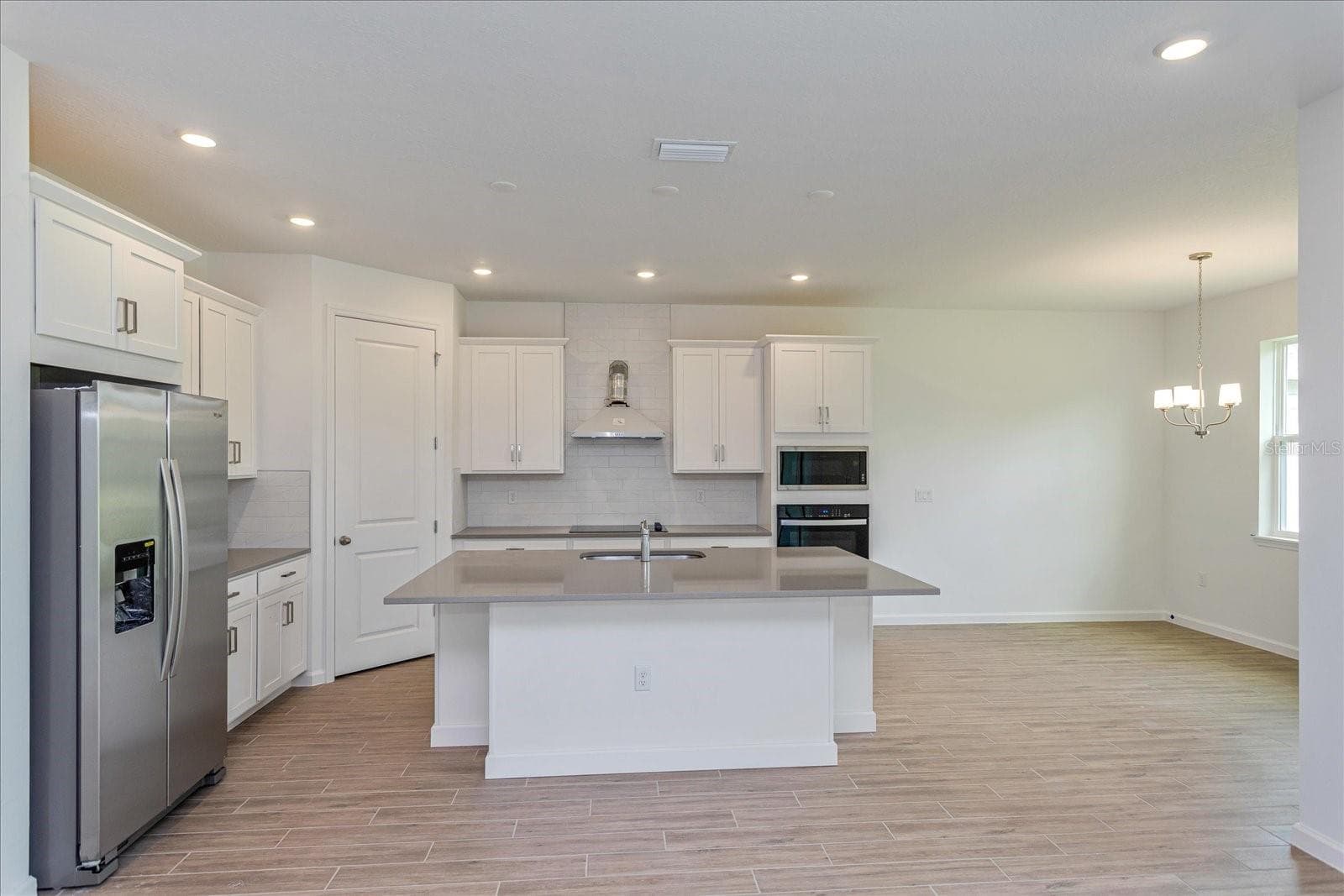 Note: The sample photos included are of the model home and are meant to showcase the craftsmanship and design quality. - 13344 PEACEFUL MELODY DR, WINTER GARDEN